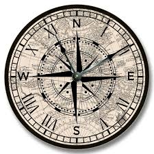 Then, while holding both map and compass steady, rotate your body until the end of the magnetic needle is within the outline of the orienting arrow. 10 5 Wall Clock Compass Rose With Old Map Pattern Wall Etsy Compass Clock Compass Rose Map Compass