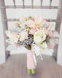 Burlap wrap with vintage buttons looks rustic and very chic. 49 Bridesmaid Bouquets Your Girls Will Love Wedding Bouquets Wedding Wedding Flowers