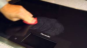 Induction heating only heats the pot. How To Clean A Glass Cooktop Electric Or Induction Youtube