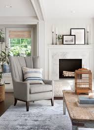 10 Best Living Rooms By Joanna Gaines From Fixer Upper Nikki S Plate In 2020 Joanna Gaines Living Room Living Room Renovation Farmhouse Fireplace Mantels