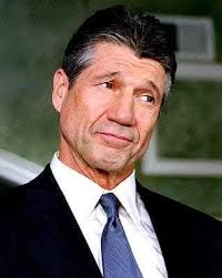 Ed Lapiz and Big Brew owner Rolando Garcia left the group