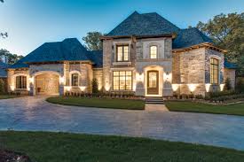 Wherever you choose to build your cottage house plan, the style adapts well to a modern. French Country Ron Davis Custom Homes