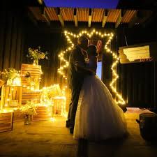 A Kiss To Light Up The Night At The Ranch Club Barn In Missoula Mt Montanawedding Montanalove Fairytalewedding Montana Wedding Fairy Tale Wedding Wedding