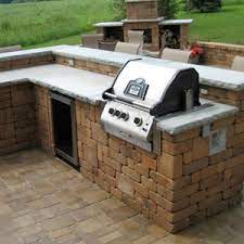 A bbq island is a great way to spruce up any backyard patio or outdoor space. Outdoor Kitchen Landscaping And Landscape Design For Patio Retaining Wall Backyard And More