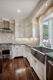 The traditional rug has vibrant colors like blue to add some dimension. Pics Of Richmond Indiana Kitchen Cabinets And Martha Stewart Kitchen Cabinet Colors Kitchencabinets Classic White Kitchen Kitchen Design Kitchen Inspirations