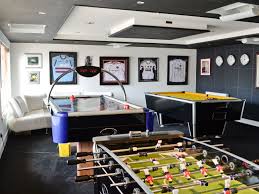 Games Room With Pool Table Table Football And Air Hockey For Endless Entertainment Garage Game Rooms Game Room Game Room Design