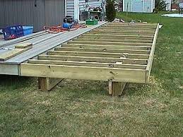expand porch on block later i installed this composite decking material but that is topic building a deck diy deck deck building plans