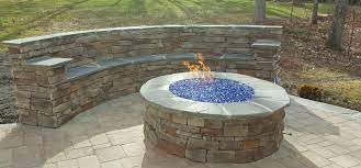 The traditional outdoor fireplace is the one that warms up an outdoor terrace or patio. Raleigh Hardscaping Stone Pavers Custom Fire Pit Patio Covis