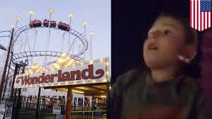 Terrifying moment boy, 6, slips out of roller coaster seat belt