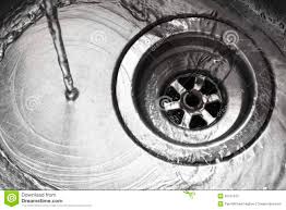 stainless steel sink plug hole stock