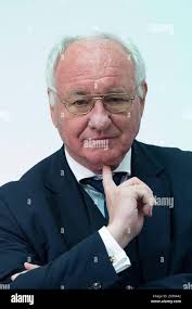 Standing chairman hi-res stock photography and images