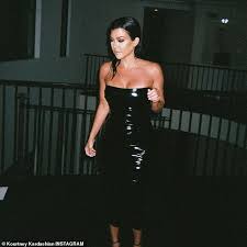 Kourtney kardashian appears to have confirmed a relationship with travis barker ahead of the final season of keeping up with the kardashians. Kourtney Kardashian Stuns In A Black Latex Dress After Sparking Dating Rumors With Travis Barker Daily Mail Online