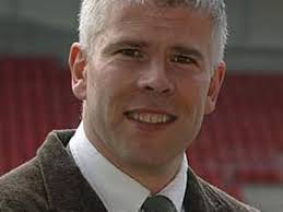 Reporter Bryn Law breaks down during Gary Speed tribute