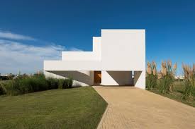 If you need an example, the house shown in the picture is the one you must look at. Nicolas Campodonico Completes Argentinean Family House With Pure All White Colour Masonry Volumes