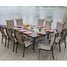 Angrove 11 Piece Patio Dining Set By Bellini Home And Gardens 2802 80 All Weather Outdoor Sling Fabric In Ne Outdoor Dining Set Patio Dining Set Patio Decor