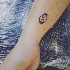 Men will love to make a cancer zodiac tattoo on their wrist with a blue ink design. 50 Cancer Zodiac Tattoos Ideas Hike N Dip