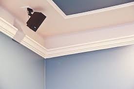Use Molding And Paint To Create The Illusion Of A Tray Ceiling Finishing Basement Baseboard Styles Basement Lighting