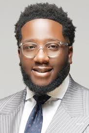 SCOTT DIST.( ) Long-time civil servant and former District Commissioner Ernie  Scott died