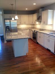 Schrock cabinetry was founded in 1961 in arthur, illinois as schrock brothers manufacturing, specializing in handcrafted cabinetry. Schrock Entra Cabinets Door Style Colefax Color Brie Wall Color Benjamin Moore Stonington Gray Cabinet Door Styles Kitchen Remodel Home Kitchens