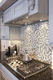 As with most projects, preparation is key. Intricate Glass Tiles Backsplash Makes This Kitchen Sparkle Homeyou