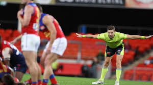 Lower the ball with the guiding hand (the equivalent hand to your kicking foot). Afl 2020 Holding The Ball Free Kicks Afl Umpiring Leaked Memo Afl Umpires State Of The Game Alastair Clarkson Umpire Comments