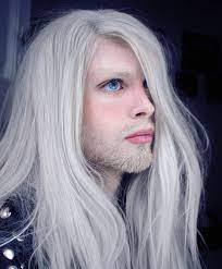 Permanently white hair starting in childhood can be genetically inherited, but unlike albinism, there the hair is often white or pale blond. Luis Padron The Elf On Instagram Based On Popular Opinion I Will Go Back To Long Hair It Will T White Hair Men Long Hair Styles Men Long White Hair