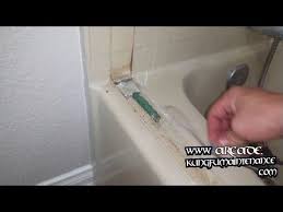 Removing Silicone Caulk Adhesive Residue After Taking Out Shower Doors Fiberglass Tub Enclosure Vid Yo Bathtub Caulking Tub Shower Doors Bathtub Shower Doors