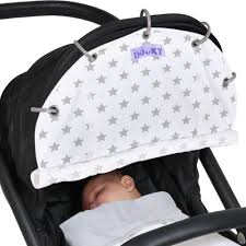 5つのリングをバギーのホロにつけるだけで日よけになる オランダ生まれのおしゃれなバギー用uvシェード 紫外線を95 もカットしてくれて持ち運びも楽ちん 洗濯okでしかもお手頃な値段とママに嬉しいポイントが満載の dooky ドュ キー はcuna select クーナ