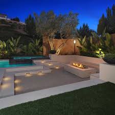 Clear an area at least 7 feet outward from the fire pit on all sides. 12 Outdoor Fire Pit Lighting Ideas The Family Handyman
