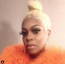 Lil' Mo leaves husband after he spit