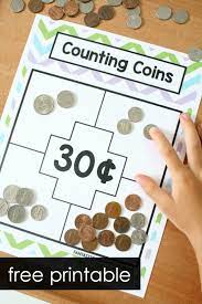 Free Printable Money Game For Kids Counting Sets Of Coins Freebie Math 1stgrade Money Games For Kids Math Games For Kids Learning Money