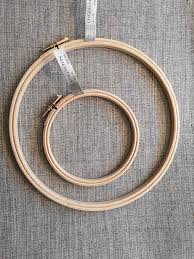 Embroidery hoop — embroidery hoops and frames are tools used to keep fabric taut while working embroidery or other forms of needlework. Wooden Embroidery Hoop Sew Irish