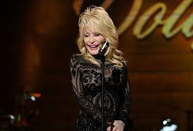 The legendary country singer premiered her new netflix series, dolly parton's heartstrings, at her dollywood theme park in pigeon forge, tennessee. Dolly Parton Opened Up About Real Life Jolene Who Bewitched Her Husband Carl Thomas Dean
