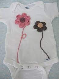 Patterns preceded by an plus sign (+) require free registration (to that particular pattern site, not to crochet pattern central) before viewing. Love City Embellished Baby Onesie Tutorial 1 Crochet Baby Clothes Crochet Crochet Baby