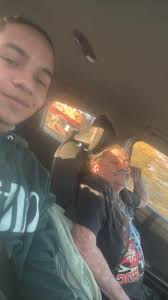 Removing a balloon from an obituary photo