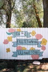 An internal fence such as the one displayed here can help define outdoor spaces, giving a clear sense of the separation of the patio. Diy Fence Mural At Home With Ashley
