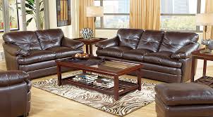 Place colored glass ornaments and a glazed bowl of golden orbs on top of the table and a vase of irises or an amaryllis nearby for depth in your color. Beige Brown White Living Room Furniture Decorating Ideas