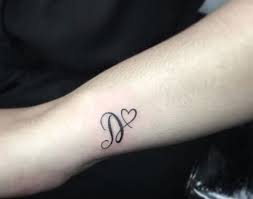 Some candy that starts with the letter d include dum dums lollipops, dove chocolates, dots, daim bars, dairy milk by cadbury, dagoba organic chocolate, divinity, dip dabs, and dew drops. 50 Amazing D Letter Tattoo Designs And Ideas Body Art Guru