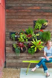 How To Make A Hanging Garden Vertical Succulent Gardens Diy Garden Projects Garden Projects