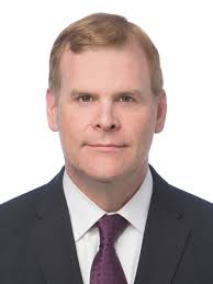 Hon. John R. Baird P.C.