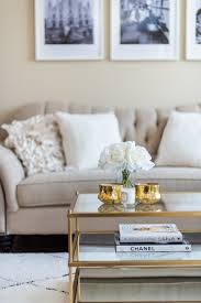 Consider working in details like gold candle holders, gold linens, gold plates, and barware to complete this stunning wedding theme. Living Room Tour White Beige Gold Decor H A N A N