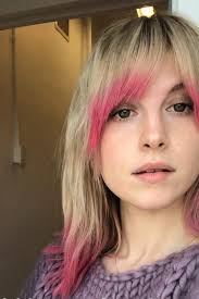 Her natural hair color is red , i have met her before and she told me it was red she just dyed it darker for her career and cause she wanted it that way. Hayley Williams Straight Ash Blonde Curved Bangs Peek A Boo Highlights Hairstyle Steal Her Style