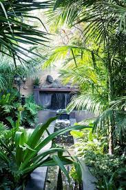 Wallpaper and home linens also have leaf designs, bringing a lush color accent to your home. 30 Top Tropical Garden Ideas Tropical Landscaping Tropical Backyard Tropical Garden
