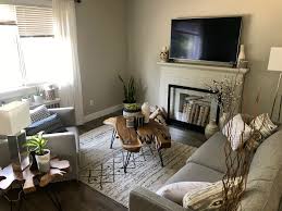 There is a round table and eight chairs opposite the door. I Feel Like The Corner Of My Living Room Is Missing Something What Can I Put By That Blank Wall Next To The Window Interiordesign