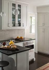 You can purchase larger plates to cover any gaps if needed. Mini Light Pendants Over Small Kitchen Peninsula Transitional Kitchen