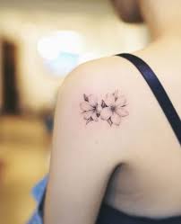 A black and gray stag is located in the center of the wearer's back while the antlers ascend upward and wrap around the wearer's shoulder blades. Special Back Shoulder Tattoo Ideas For Women Page 15 Of 61 Lovein Home