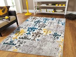 Soothing shades of black and gray form an intriguing abstract sure to elevate your space with contemporary flair. Pin On Area Rugs Runners Pads