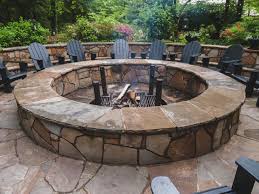 Incorporate draw holes into the design to permit air flow into the fire pit. Round Stone Fire Pit Fireplace Design Ideas Large Fire Pit Stone Fire Pit Outdoor Fire Pit
