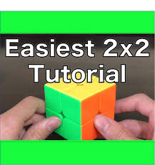 Pry up the middle piece on the top layer. How To Solve A 2x2 Rubik S Cube Cool Cube Merch