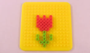 This product is 2¾ inches by 2¾ inches this magnet is on my fridge door! 10 Easy Spring Perler Bead Patterns Krysanthe